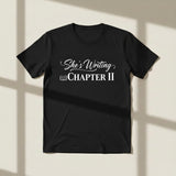 She’s Writing Chapter II CPTR-II Black T-Shirt | Empowering Women’s Graphic Tee