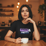 Woman wearing 'STRONG & PRETTY' regular fit cotton quote t-shirt by Trendble India, sitting at a table with a cup of coffee in a cozy indoor setting.
 - View 2