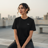 Trendble logo detail on Essential lightweight everyday T-shirt India premium minimal design female model wearing t-shirt - View 1